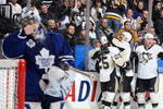 TORONTO - JANUARY 31:  Vesa Toskala #35 of the Toronto Maple Leafs despairs as Maxime Talbot #25, Pascal Dupuis #9 and Rob Scuderi #4 of the Pittsburgh Penguins celebrate a goal during the game at Air Canada Centre on January 31, 2009 in Toronto, Ontario, Canada. (Photo by Dave Sandford/Getty Images)