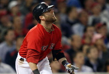 BOSTON - OCTOBER 02:  Dustin Pedroia #15 of the Boston Red Sox drives in a run in the third inning against the Cleveland Indians on October 2, 2009 at Fenway Park in Boston, Massachusetts.  (Photo by Elsa/Getty Images)