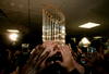 HOUSTON - OCTOBER 26:  The Championship trophy is passed around the Chicago White Sox locker room after winning Game Four of the 2005 Major League Baseball World Series against the Houston Astros at Minute Maid Park on October 26, 2005 in Houston, Texas. The Chicago White Sox defeated the Houston Astros 1-0 to win the World Series 4 games to 0.  (Photo by Jed Jacobsohn/Getty Images)