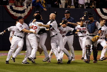MINNEAPOLIS - OCTOBER 06:  The Minnesota Twins celebrate after defeating the Detroit Tigers during the American League Tiebreaker game on October 6, 2009 at Hubert H. Humphrey Metrodome in Minneapolis, Minnesota.  (Photo by Jamie Squire/Getty Images)