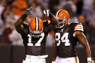 CLEVELAND - AUGUST 29:  Braylon Edwards #17 of the Cleveland Browns celebrates after scoring a touchdown with Robert Royal #84 against the Tennessee Titans at Cleveland Browns Stadium on August 29, 2009 in Cleveland, Ohio.  (Photo by Matt Sullivan/Getty Images)