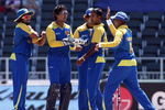 JOHANNESBURG, SOUTH AFRICA - SEPTEMBER 27:  Nuwan Kulasekara (2nd R) of Sri Lanka is congratulated by team mates on the wicket of Jesse Ryder of New Zealand during the ICC Champions Trophy Group B match between New Zealand and Sri Lanka played at Wanderers Stadium on September 27, 2009 in Johannesburg, South Africa.  (Photo by Hamish Blair/Getty Images)