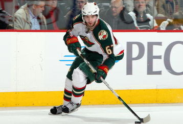 PHILADELPHIA - JANUARY 08:  Benoit Pouliot #67 of the Minnesota Wild skates against the Philadelphia Flyers on January 8, 2009 at Wachovia Center in Philadelphia, Pennsylvania.  (Photo by Jim McIsaac/Getty Images)