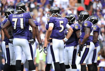 BALTIMORE - SEPTEMBER 27:  Joe Flacco #5 of the Baltimore Ravens huddles with the offense during the game against the Cleveland Browns at M&T Bank Stadium on September 27, 2009 in Baltimore, Maryland. The Ravens defeated the Browns 34-3. (Photo by Larry French/Getty Images)