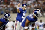 ARLINGTON, TX - SEPTEMBER 20:  Quarterback Eli Manning #10 of the New York Giants during play against the Dallas Cowboys at Cowboys Stadium on September 20, 2009 in Arlington, Texas.  (Photo by Ronald Martinez/Getty Images)