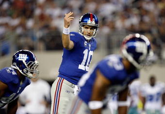ARLINGTON, TX - SEPTEMBER 20:  Quarterback Eli Manning #10 of the New York Giants during play against the Dallas Cowboys at Cowboys Stadium on September 20, 2009 in Arlington, Texas.  (Photo by Ronald Martinez/Getty Images)