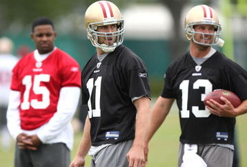 SANTA CLARA, CA - MAY 01:  Michael Crabtree #15 of the San Francisco 49ers looks on during practice as quaterback Alex Smith #11 and Shaun Hill #13 practice during the 49ers Minicamp at their training facilities on May 1, 2009 in Santa Clara, California. (Photo by Jed Jacobsohn/Getty Images)