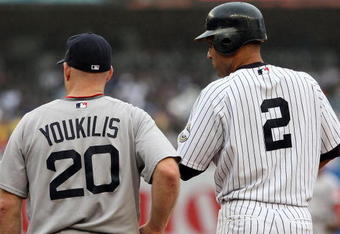 NEW YORK - SEPTEMBER 27:  Derek Jeter #2 of the New York Yankees and Kevin Youkilis #20 of the Boston Red Sox look on on September 27, 2009 at Yankee Stadium in the Bronx borough of New York City.  (Photo by Jim McIsaac/Getty Images)