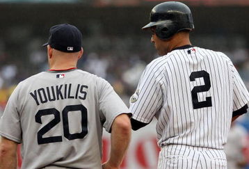 NEW YORK - SEPTEMBER 27:  Derek Jeter #2 of the New York Yankees and Kevin Youkilis #20 of the Boston Red Sox look on on September 27, 2009 at Yankee Stadium in the Bronx borough of New York City.  (Photo by Jim McIsaac/Getty Images)