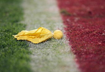 MIAMI GARDENS, FL - JANUARY 3:  A penalty flag lies on the field during the Fed Ex Orange Bowl  between the Florida State Seminoles and the Penn State Nittany Lions at Dolphins Stadium on January 3, 2005 in Miami Gardens, Florida. The Lions won 26-23 in triple overtime. (Photo by Scott Halleran/Getty Images)