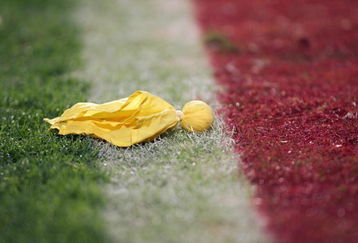MIAMI GARDENS, FL - JANUARY 3:  A penalty flag lies on the field during the Fed Ex Orange Bowl  between the Florida State Seminoles and the Penn State Nittany Lions at Dolphins Stadium on January 3, 2005 in Miami Gardens, Florida. The Lions won 26-23 in triple overtime. (Photo by Scott Halleran/Getty Images)