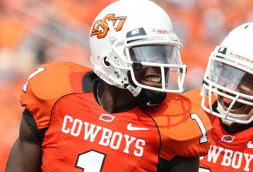 STILLWATER, OK - SEPTEMBER 5:  Wide receiver Dez Bryant #1 of the Oklahoma State Cowboys celebrates his touchdown with teammate Dexter Pratt #22 during the second quarter of the game against the Georgia Bulldogs at Boone Pickens Stadium on September 5, 2009 in Stillwater, Oklahoma. (Photo by Christian Petersen/Getty Images)