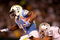 OAKLAND, CA - SEPTEMBER 14:  LaDainian Tomlinson #21 of the San Diego Chargers is tackled by Tyvon Branch #33 of the Oakland Raiders during their game on September 14, 2009 at the Oakland-Alameda County Coliseum in Oakland, California.  (Photo by Ezra Shaw/Getty Images)