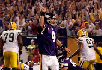 MINNEAPOLIS - OCTOBER 05:  Quarterback Brett Favre #4 of the Minnesota Vikings celebrates after a touchdown during the game against the Green Bay Packers on October 5, 2009 at Hubert H. Humphrey Metrodome in Minneapolis, Minnesota.  (Photo by Jamie Squire/Getty Images)