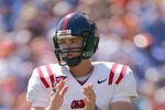 GAINESVILLE, FL - SEPTEMBER 27:  Quarterback Jevan Snead #4 Mississippi Rebels claps on the field during the game against the Florida Gators during the game at Ben Hill Griffin Stadium on September 27, 2008 in Gainesville, Florida.  (Photo by Sam Greenwood/Getty Images)
