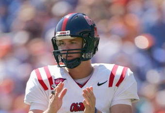 GAINESVILLE, FL - SEPTEMBER 27:  Quarterback Jevan Snead #4 Mississippi Rebels claps on the field during the game against the Florida Gators during the game at Ben Hill Griffin Stadium on September 27, 2008 in Gainesville, Florida.  (Photo by Sam Greenwood/Getty Images)
