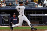 NEW YORK - SEPTEMBER 27:  Derek Jeter #2 of the New York Yankees follows through on a first inning single against the Boston Red Sox on September 27, 2009 at Yankee Stadium in the Bronx borough of New York City.  (Photo by Jim McIsaac/Getty Images)
