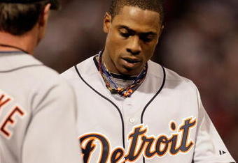 MINNEAPOLIS - OCTOBER 06:  Curtis Granderson #28 of the Detroit Tigers walks off the field after being stranded on base during the American League Tiebreaker game against the Minnesota Twins on October 6, 2009 at Hubert H. Humphrey Metrodome in Minneapolis, Minnesota.  (Photo by Jamie Squire/Getty Images)