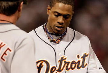 MINNEAPOLIS - OCTOBER 06:  Curtis Granderson #28 of the Detroit Tigers walks off the field after being stranded on base during the American League Tiebreaker game against the Minnesota Twins on October 6, 2009 at Hubert H. Humphrey Metrodome in Minneapolis, Minnesota.  (Photo by Jamie Squire/Getty Images)