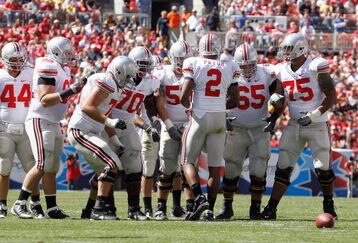 CLEVELAND - SEPTEMBER 19:  Quarterback Terrelle Pryor #2 of the Ohio State Buckeyes leads the huddle during the game against the Toledo Rockets at Cleveland Browns Stadium on September 19, 2009 in Cleveland, Ohio. The Ohio State Buckeyes shutout the Toledo Rockets 38-0. (Photo by Gregory Shamus/Getty Images)