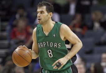 CHARLOTTE, NC - MARCH 16:  Jose Calderon #8 of the Toronto Raptors dribbles downcourt against the Charlotte Bobcats during their game at Time Warner Cable Arena on March 16, 2009 in Charlotte, North Carolina.  NOTE TO USER: User expressly acknowledges and agrees that, by downloading and/or using this Photograph, user is consenting to the terms and conditions of the Getty Images License Agreement. (Photo by: Streeter Lecka/Getty Images)
