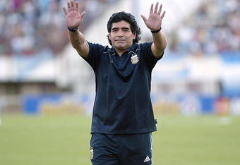 BUENOS AIRES, BUENOS AIRES - MARCH 28: Argentine manager Diego Maradona waves to the fans prior to the 2010 FIFA World Cup South African qualifier match between Argentina and Venezuela at River Plate Stadium on March 28, 2009 in Buenos Aires, Argentina.  (Photo by Photogamma/Getty Images)