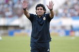 BUENOS AIRES, BUENOS AIRES - MARCH 28: Argentine manager Diego Maradona waves to the fans prior to the 2010 FIFA World Cup South African qualifier match between Argentina and Venezuela at River Plate Stadium on March 28, 2009 in Buenos Aires, Argentina.  (Photo by Photogamma/Getty Images)