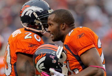 DENVER - OCTOBER 04:  Defensive backs Brian Dawkins #20 and Champ Bailey #24 of the Denver Broncos converse during the final drive by the Dallas Cowboys during NFL action at Invesco Field at Mile High on October 4, 2009 in Denver, Colorado. The Broncos defeated the Cowboys 17-10.  (Photo by Doug Pensinger/Getty Images)
