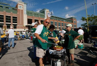 GREEN BAY, WI - SEPTEMBER 20: Fans tailgate in the parking lot outside of Lambeau Field prior to the game between the  Green Bay Packers against the Cincinnati Bengals at Lambeau Field on September 20, 2009 in Green Bay, Wisconsin. (Photo by Scott Boehm/Getty Images)