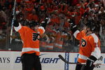 PHILADELPHIA - OCTOBER 06: Kimmo Timonen #44 (L) and Matt Carle #25 (R) of the Philadelphia Flyers celebrate Timonen's goal against the Washington Capitals at the Wachovia Center on October 6, 2009 in Philadelphia, Pennsylvania. The Flyers defeated the Capitals 6-5. (Photo by Bruce Bennett/Getty Images)