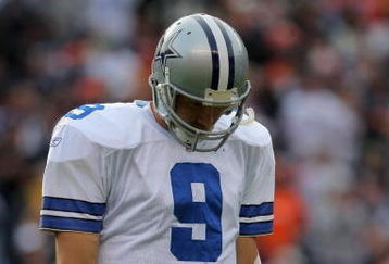 DENVER - OCTOBER 04:  Quarterback Tony Romo #9 of the Dallas Cowboys walks to the bench after failing to convert a third down against the Denver Broncos during NFL action at Invesco Field at Mile High on October 4, 2009 in Denver, Colorado. The Broncos defeated the Cowboys 17-10.  (Photo by Doug Pensinger/Getty Images)