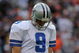 DENVER - OCTOBER 04:  Quarterback Tony Romo #9 of the Dallas Cowboys walks to the bench after failing to convert a third down against the Denver Broncos during NFL action at Invesco Field at Mile High on October 4, 2009 in Denver, Colorado. The Broncos defeated the Cowboys 17-10.  (Photo by Doug Pensinger/Getty Images)