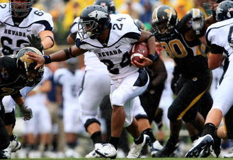 COLUMBIA, MO - SEPTEMBER 13:  Vai Taua #34 the Nevada Wolf Pack carries the ball during the first half of the game against the Missouri Tigers on September 13, 2008 at Memorial Stadium in Columbia, Missouri.  (Photo by Jamie Squire/Getty Images)