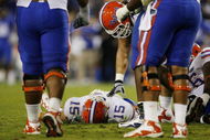 LEXINGTON, KY - SEPTEMBER 26: Quarterback Tim Tebow #15 of the Florida Gators lays on the ground after being sacked by Taylor Wyndham #94 of the Kentucky Wildcats during the third quarter of the game at Commonwealth Stadium on September 26, 2009 in Lexington, Kentucky. (Photo by Andy Lyons/Getty Images)