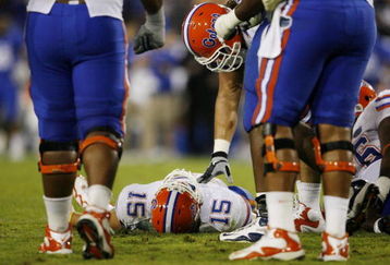 LEXINGTON, KY - SEPTEMBER 26: Quarterback Tim Tebow #15 of the Florida Gators lays on the ground after being sacked by Taylor Wyndham #94 of the Kentucky Wildcats during the third quarter of the game at Commonwealth Stadium on September 26, 2009 in Lexington, Kentucky. (Photo by Andy Lyons/Getty Images)