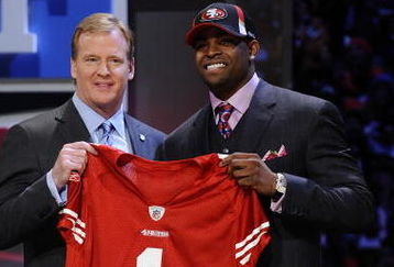NEW YORK - APRIL 25:  NFL Commissioner Roger Goodell poses with with San Francisco 49ers #10 draft pick Michael Crabtree at Radio City Music Hall for the 2009 NFL Draft on April 25, 2009 in New York City  (Photo by Jeff Zelevansky/Getty Images)