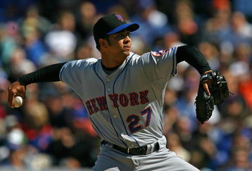 CHICAGO - AUGUST 30: Nelson Figueroa #27 of the New York Mets delivers the ball against the Chicago Cubs on August 30, 2009 at Wrigley Field in Chicago, Illinois. The Mets defeated the Cubs 4-1. (Photo by Jonathan Daniel/Getty Images)