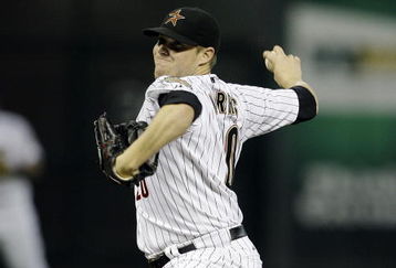HOUSTON - SEPTEMBER 23:  Pitcher Bud Norris #20 of the Houston Astros throws in the first inning at Minute Maid Park on September 23, 2009 in Houston, Texas. Houston won 3-0. (Photo by Bob Levey/Getty Images)