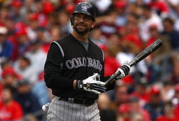 PHILADELPHIA - OCTOBER 07:  Todd Helton #17 of the COlorado Rockies walks bakc to the dugout after he committed an out against the Philadelphia Phillies  in Game One of the NLDS during the 2009 MLB Playoffs at Citizens Bank Park on October 7, 2009 in Philadelphia, Pennsylvania.  (Photo by Chris McGrath/Getty Images)