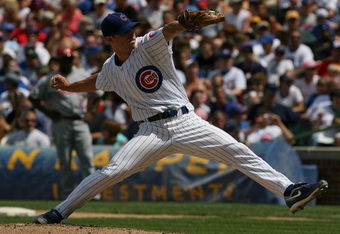CHICAGO - JULY 26: Starting pitcher Rich Harden #40 of the Chicago Cubs delivers the ball against the Cincinnati Reds on July 26, 2009 at Wrigley Field in Chicago, Illinois. (Photo by Jonathan Daniel/Getty Images)