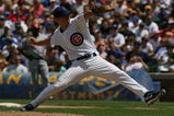 CHICAGO - JULY 26: Starting pitcher Rich Harden #40 of the Chicago Cubs delivers the ball against the Cincinnati Reds on July 26, 2009 at Wrigley Field in Chicago, Illinois. (Photo by Jonathan Daniel/Getty Images)