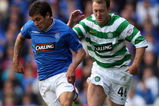 GLASGOW, SCOTLAND - OCTOBER 4: Aiden McGeady of Celtic and Nacho Novo of Rangers in action during the  Clydesdale Bank Scottish Premier League match between Rangers and Celtic at Ibrox on October 4, 2009 in Glasgow, Scotland. (Photo by Ian MacNicol/Getty Images)