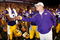 BATON ROUGE, LA - SEPTEMBER 19:  Jordan Jefferson #9 shakes hands with head coach Les Miles  of the Louisiana State University Tigers after defeating the University of Louisiana-Lafatette Ragin' Cajuns at Tiger Stadium 31-3 on September 19, 2009 in Baton Rouge, Louisiana.  (Photo by Chris Graythen/Getty Images)
