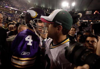 MINNEAPOLIS - OCTOBER 05:  Quarterback Brett Favre #4 of the Minnesota Vikings hugs Aaron Rodgers #12 of the Green Bay Packers following the Vikings victory over the Packers on October 5, 2009 at Hubert H. Humphrey Metrodome in Minneapolis, Minnesota.  (Photo by Jamie Squire/Getty Images)