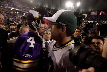 MINNEAPOLIS - OCTOBER 05:  Quarterback Brett Favre #4 of the Minnesota Vikings hugs Aaron Rodgers #12 of the Green Bay Packers following the Vikings victory over the Packers on October 5, 2009 at Hubert H. Humphrey Metrodome in Minneapolis, Minnesota.  (Photo by Jamie Squire/Getty Images)