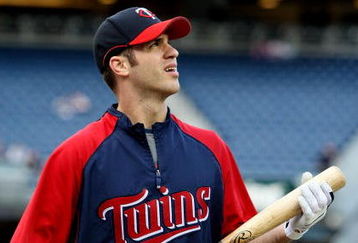NEW YORK - OCTOBER 07:  Joe Mauer #7 of the Minnesota Twins looks on during batting practice before Game One of the ALDS against the New York Yankees during the 2009 MLB Playoffs at Yankee Stadium on October 7, 2009 in the Bronx borough of New York City.  (Photo by Jim McIsaac/Getty Images)