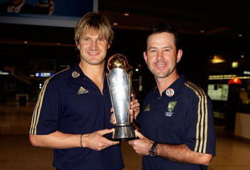 SYDNEY, AUSTRALIA - OCTOBER 07:  Ricky Ponting and Shane Watson of Australia pose for a photograph with the ICC trophy during a press conference upon their return to Australia at Sydney International Airport on October 7, 2009 in Sydney, Australia. Ponting and Watson have returned home following Australia victory in the ICC Champions Trophy in South Africa.  (Photo by Brendon Thorne/Getty Images)