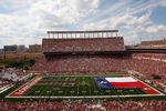 AUSTIN, TX - SEPTEMBER 26:  A Texas flag on the field before a game between the UTEP Miners and the Texas Longhorns at Darrell K Royal-Texas Memorial Stadium on September 26, 2009 in Austin, Texas.  (Photo by Ronald Martinez/Getty Images)