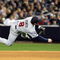 NEW YORK - OCTOBER 07:  Nick Punto #8 of the Minnesota Twins throws to first base to make an out against the New York Yankees in Game One of the ALDS during the 2009 MLB Playoffs at Yankee Stadium on October 7, 2009 in the Bronx borough of New York City.  (Photo by Nick Laham/Getty Images)