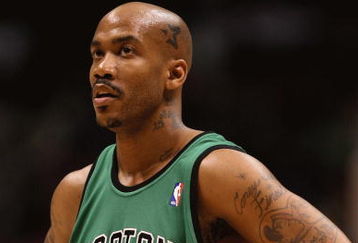 EAST RUTHERFORD, NJ - MARCH 04:  Stephon Marbury #8 of Boston Celtics looks on against the New Jersey Nets during their game on March 4th, 2009 at The Izod Center in East Rutherford, New Jersey.  NOTE TO USER: User expressly acknowledges and agrees that, by downloading and/or using this Photograph, user is consenting to the terms and conditions of the Getty Images License Agreement. Photo By Al Bello/Getty Images  (Photo by Al Bello/Getty Images)